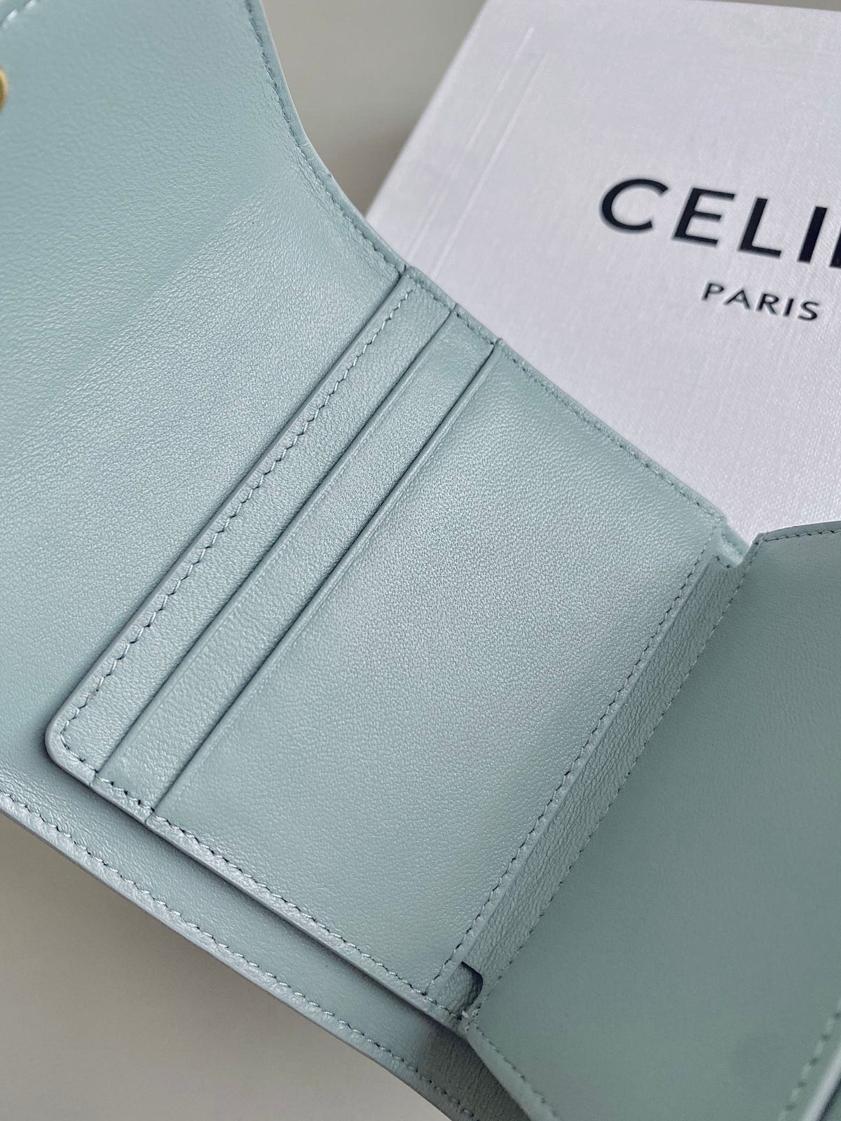 CELINE TRIPHOME 10 TRIFOLD WALLET CALFSKIN BLUE PASTEL