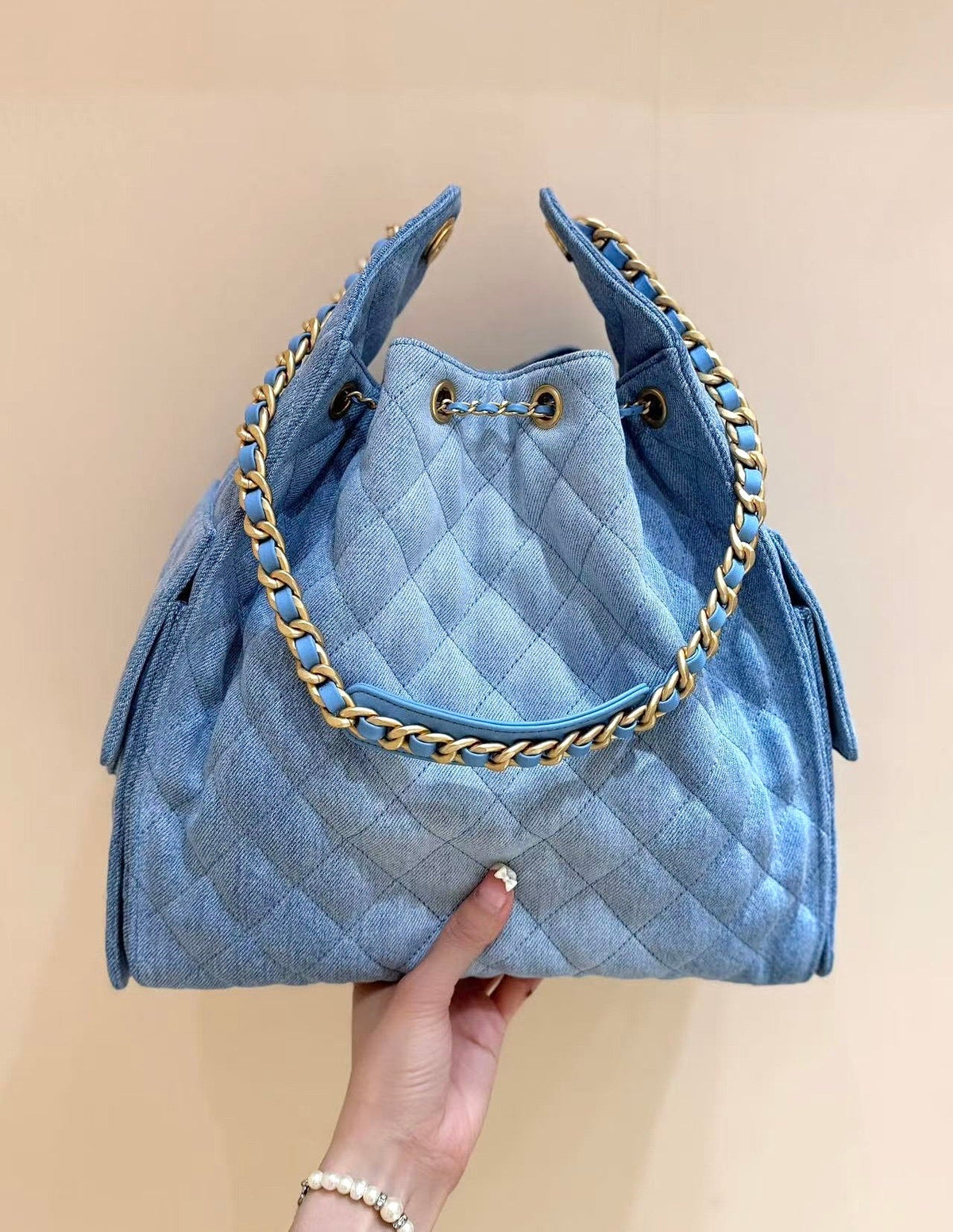 CHANEL 25 HANDBAG 40 IN BLUE DENIM GOLD HARDWARE